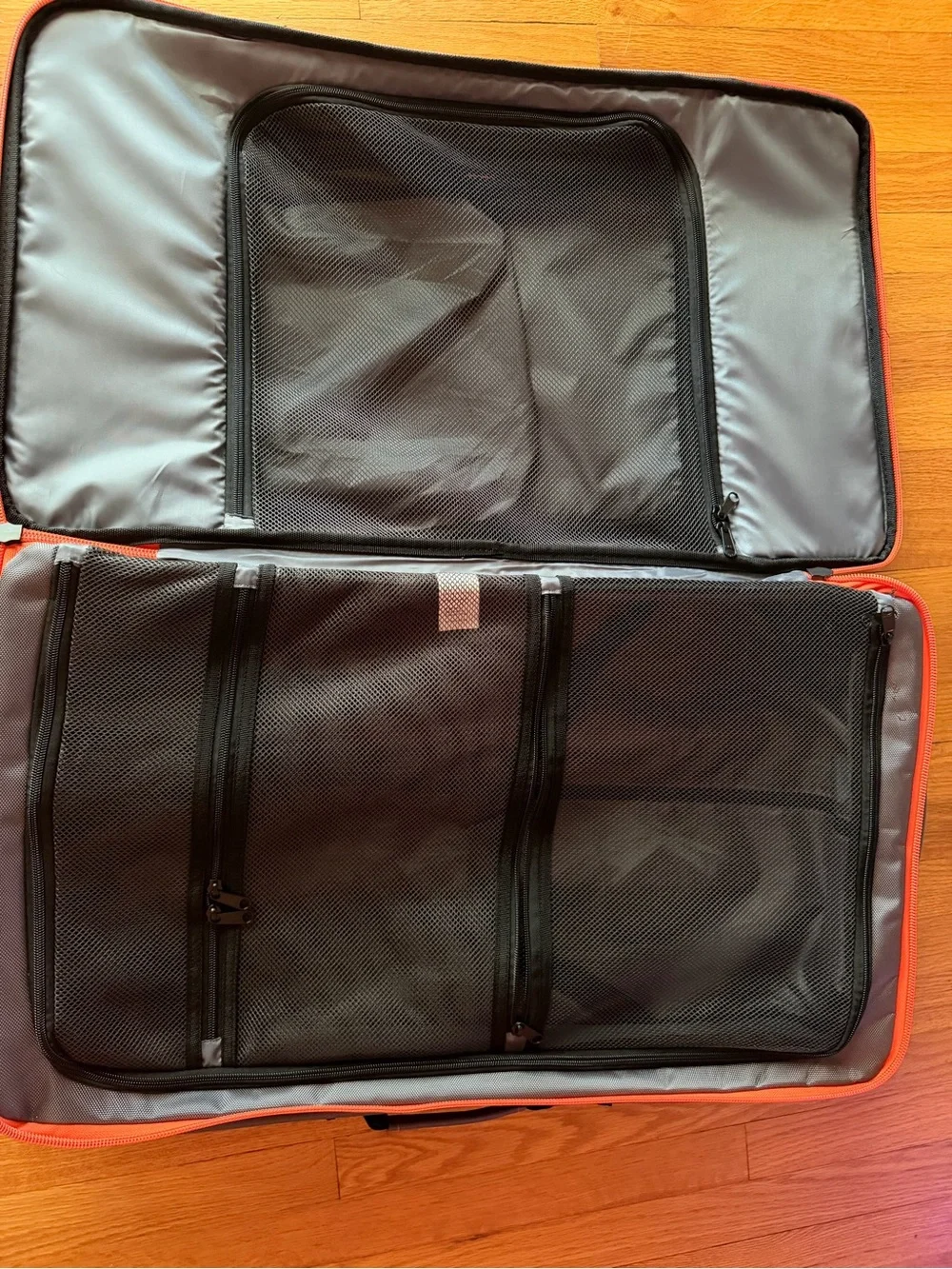 JOOLA Gray Backpack with Orange Accents